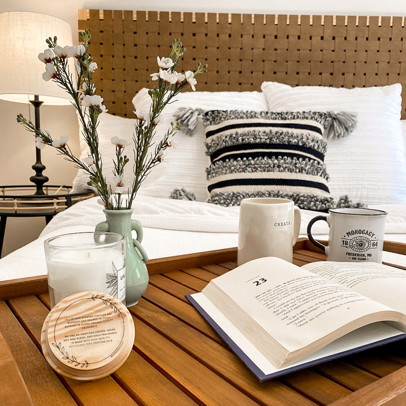 staged tray on bed